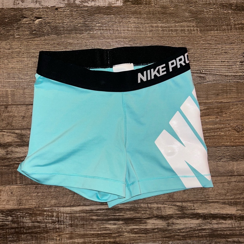 Teal Nike Pro shorts